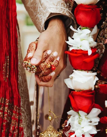 authentic-indian-bride-groom-s-hands-holding-together-traditional-wedding-attire authentic-indian-bride-groom-s-hands-holding-together-traditional-wedding-attire