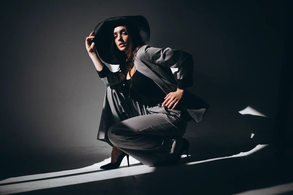 woman-model-business-suit-wearing-hat